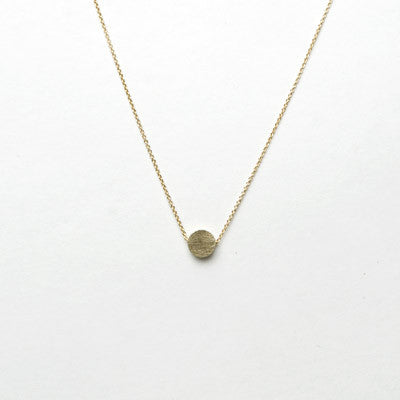 Carla Caruso Circle Button Collection